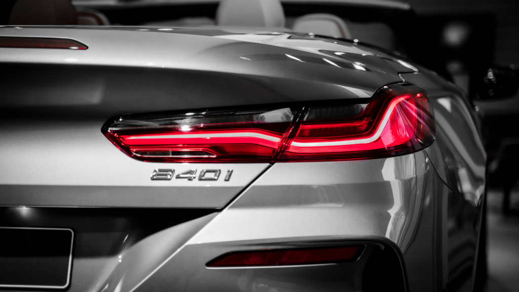 Silver Car with Chrome Emblems