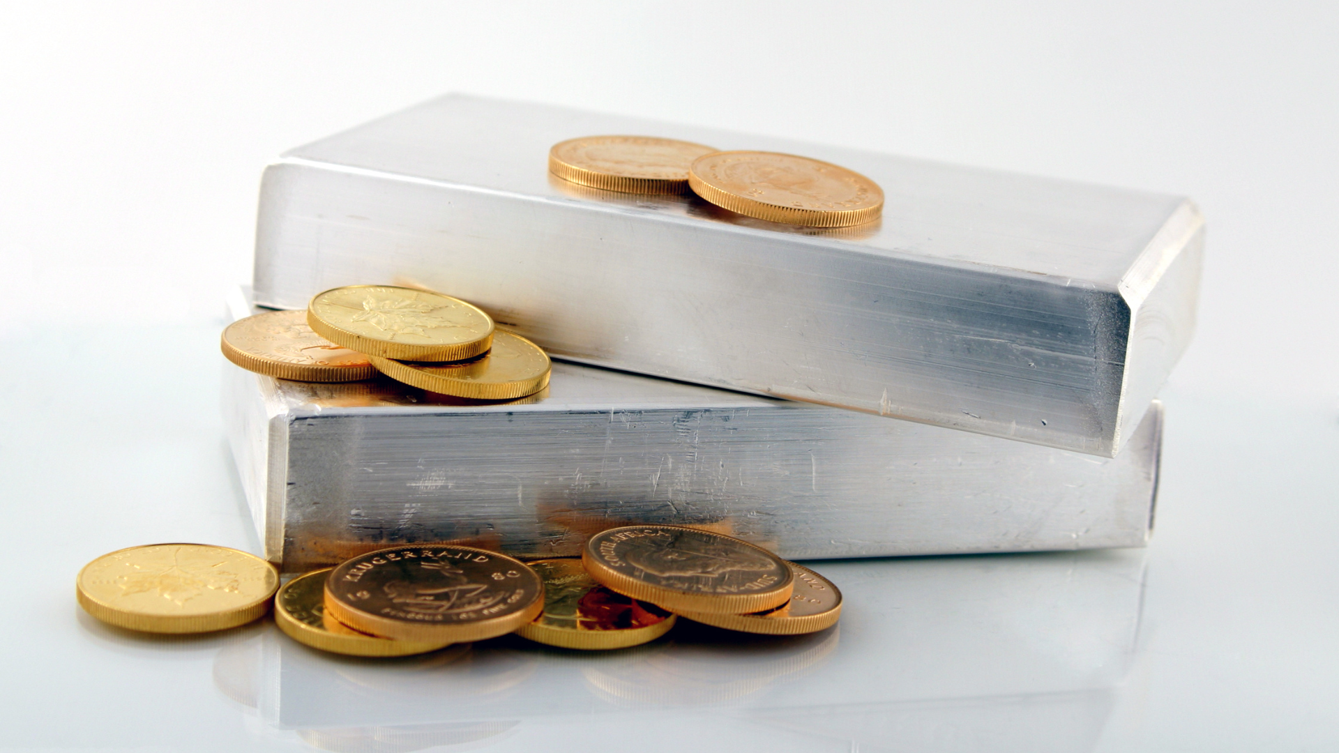 Silver Bars with Gold Coins.