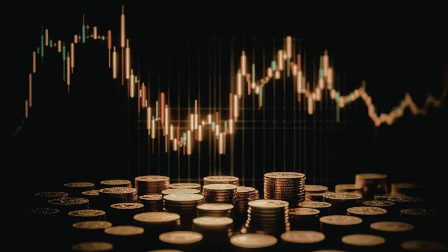 Market trends and financial growth represented by coins and graph