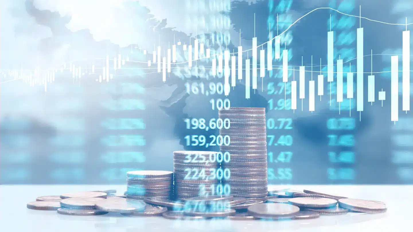 Market charts with coins and candlesticks
